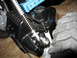 1984 Ford Bronco - Detail of a remote control car's suspension system, showing springs and mechanical linkages.