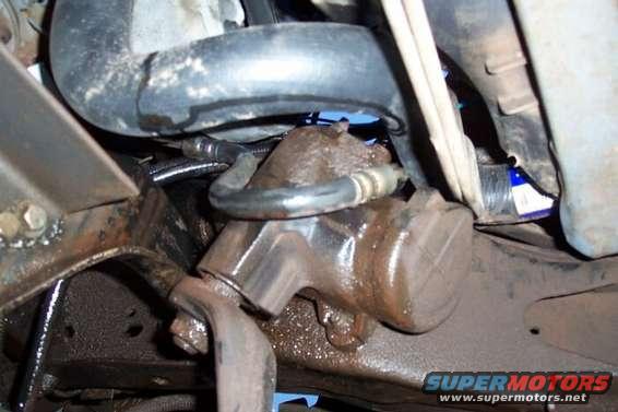 saginaw_hose_2.jpg Here's how the stock van high pressure line sits around the steering box.  Notice how ackward it is.