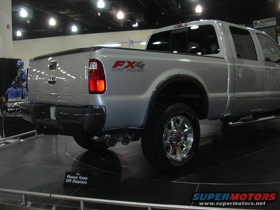 Silver Ford Super Duty pickup truck with FX4 Off-Road decal on the fender
