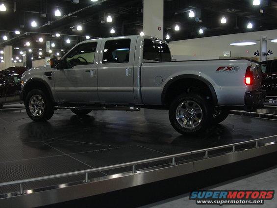 Silver Ford F-Series pickup truck with FX4 badging, side view
