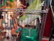 1986 Ford Bronco - Parrot in a cage with toys.