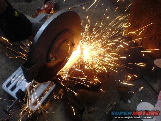 Metal cutting with a grinder, sparks flying