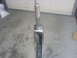 1967 Ford Bronco - A close-up view of a metal suspension component, likely undergoing restoration or repair.