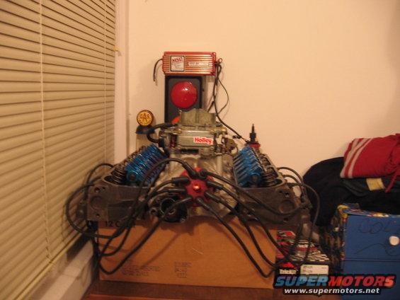 colins-stuff-002.jpg engine as of Feb. '07
Carb, Intake, Heads, 1.72 Roller Rockers, Distributor with wires on, MSD 6A Box and Blaster 3 Coil.