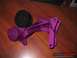 1970 Mercury Cougar - Automotive part, possibly a bracket or mount, painted purple with a pulley.