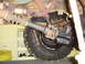 1996 Ford Bronco - Undercarriage view showing the driveshaft, U-joint, and rear axle assembly of a vehicle.