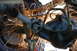 1996 Ford Bronco - Sparks fly as a driveshaft and differential are worked on, suggesting mechanical repair or modification.