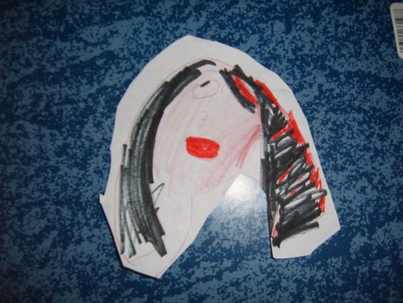 Child's drawing of a person with black hair and red lips on a blue textured background