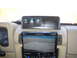 1996 Ford Bronco - Interior view of a vehicle's dashboard, showing aftermarket switches and a multimedia receiver.