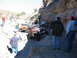 1996 Ford Bronco - A group of Jeeps navigates a challenging off-road trail through a canyon.