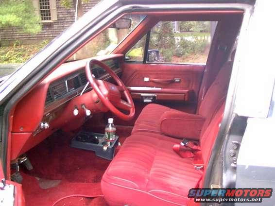 dsc00003c.jpg View in from the drivers door. Note that my interior is red, the flash makes it look pink.