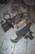 1968 Ford Mustang - Disassembled car heater core, blower motor, and associated ducting components are shown on a garage floor.