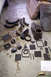 1968 Ford Mustang - Various parts of a car's heating and ventilation system are laid out on a concrete floor, including a heater core, ducting, and blower moto…