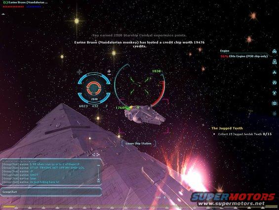 Space scene from a video game with a large pyramid-shaped ship and a smaller ship in the distance