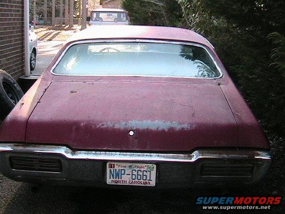 Maroon 1968 Pontiac Lemans rear view with North Carolina license plate NWP-6661