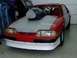 1990 Ford Mustang - Front view of a 1990 Ford Mustang modified for drag racing, a prominent hood scoop and roll cage.