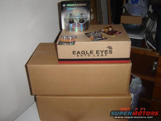 Boxes of Eagle Eyes auto lamps and Nighthawk bulbs stacked up