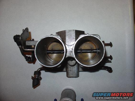 Dual throttle body assembly with two large openings and visible butterfly valves