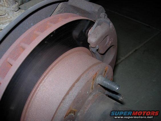 Drivers side very smooth both sides.  No rust where pads made contact.