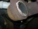 Passenger side caliper.   Seal is flat and hard.  Piston is frozen.