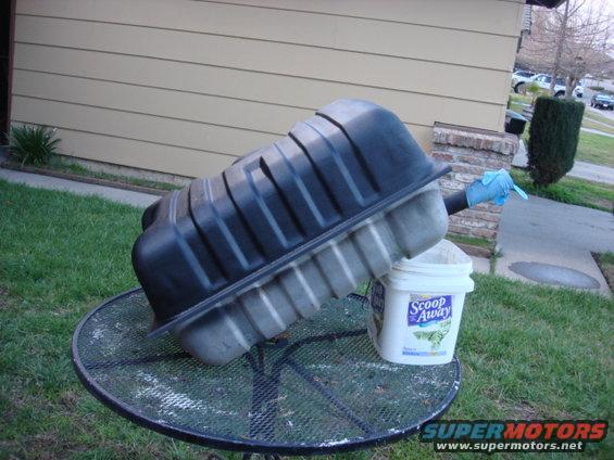 gastankpaint.jpg here is the tank after it was cleaned and undercoated on the bottom. there is a coat of flat black over the under coat.