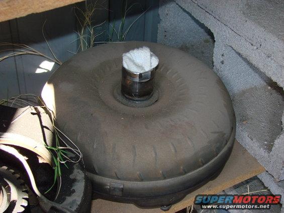 torque converter with white cloth stuffed in the input shaft opening