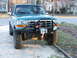 1996 Ford Bronco - This 1996 Ford Bronco features a custom front bumper with an integrated winch and off-road tires.