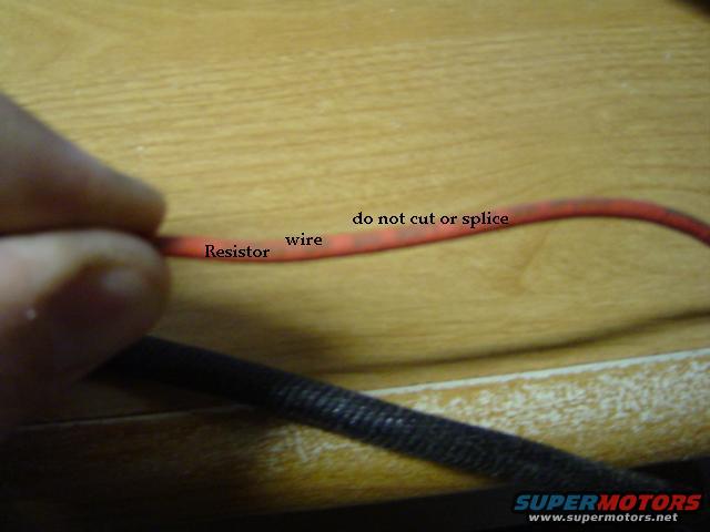 Red wire with 'Resistor' and 'wire' labels, and 'do not cut or splice' text. A black braided cable is below