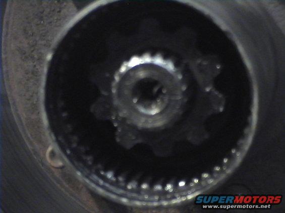 Close-up of a splined hub with a central bolt hole