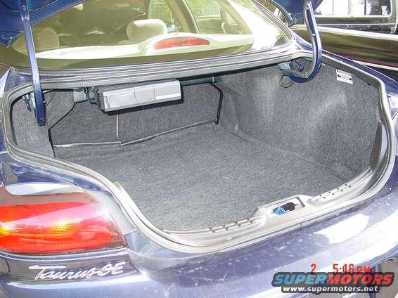 dsc00601.jpg A pic of my Taurii's "spacious" trunk and my Alpine cd-changer... it sends FM signals to the radio so I can play tapes also...(like I ever do that anymore) 