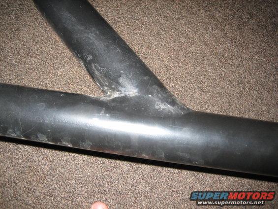 Black roll bar tubing with welded joint