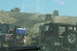 1995 Ford Bronco - A convoy of Jeeps navigates a challenging off-road terrain on a sunny day.