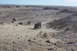 1995 Ford Bronco - A convoy of off-road vehicles traverses a dusty desert terrain, kicking up dust as they go.