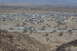 1995 Ford Bronco - A large group of vehicles and RVs are gathered in a desert area.