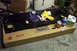 1968 Ford Mustang - A car part is laid out on a box with various cleaning supplies and tools for restoration.