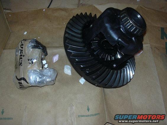Differential gear set and a packaged part on cardboard