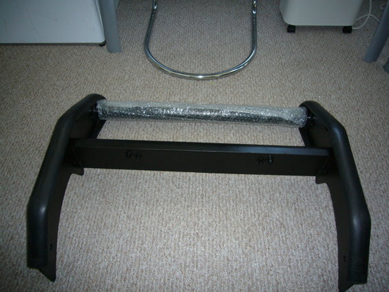 Black bull bar with bubble wrap on horizontal bar