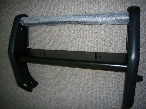 Black bull bar with bubble wrap on the top bar