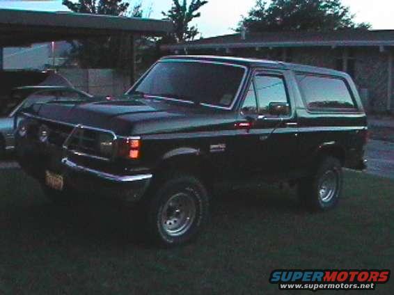 pana0024.jpg Here's my stock looking U-Boat with the Warn 9000 on the front.  That's a Warn frame mount "brush guard" holding it up.  Came with the truck, and it's capable of towing the 5000lb vehicle in park, with brake on, and dry ground.  BTW, mesquite trees have some solid root systems.  I've drilled and tapped the Eagle wheels to accept the stock hub caps, just didn't have them on.  Mile Marker hubs of questionable quality are installed fro fall.  I put the autos back on in summer.  Ask me why.