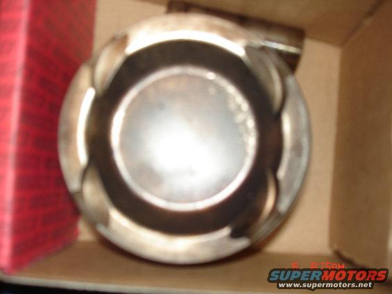 Engine piston inside a cardboard box