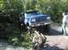 1990 Ford Bronco - using the hi lift to get the front tires on the bridge