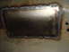1996 Ford Bronco - A rectangular metal patch has been welded into a rusted surface, showing signs of repair work.