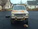 1983 Ford Ranger - A 1983 Ford Ranger pickup truck is shown from the front, parked on an asphalt surface.