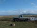 1983 Ford Ranger - This 1983 Ford Ranger is parked in a muddy field under a partly cloudy sky.