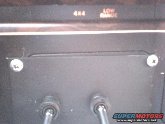 Dashboard with 4x4 and LOW RANGE labels above two levers