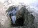 1982 Chevrolet C/K Pickup - A person digs a deep hole in the ground, with snow visible in the background.