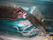 1996 Ford Bronco - Welding magnets hold new metal in place during floor repair on a 1996 Ford Bronco.