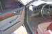 1993 Ford Bronco - Interior view of a car's driver side door, dashboard, and steering wheel.