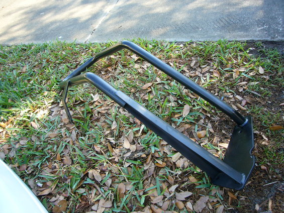 Go Rhino push bumper lying on grass and leaves