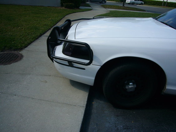 White police car front with push bumper
